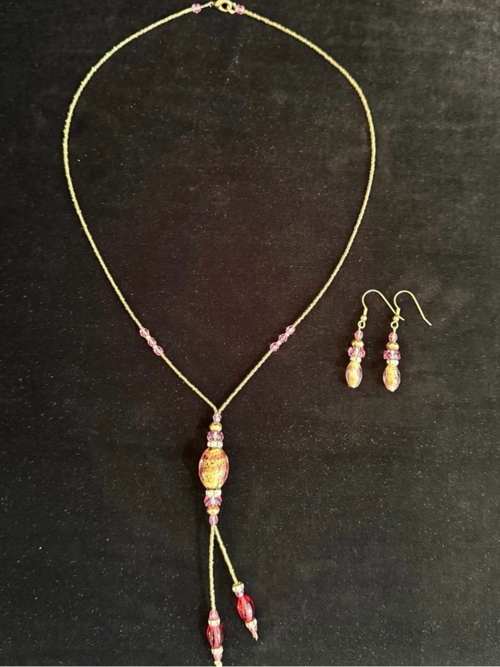 Pink and gold beaded murano glass drop down Necklace and matching drop earrings.
